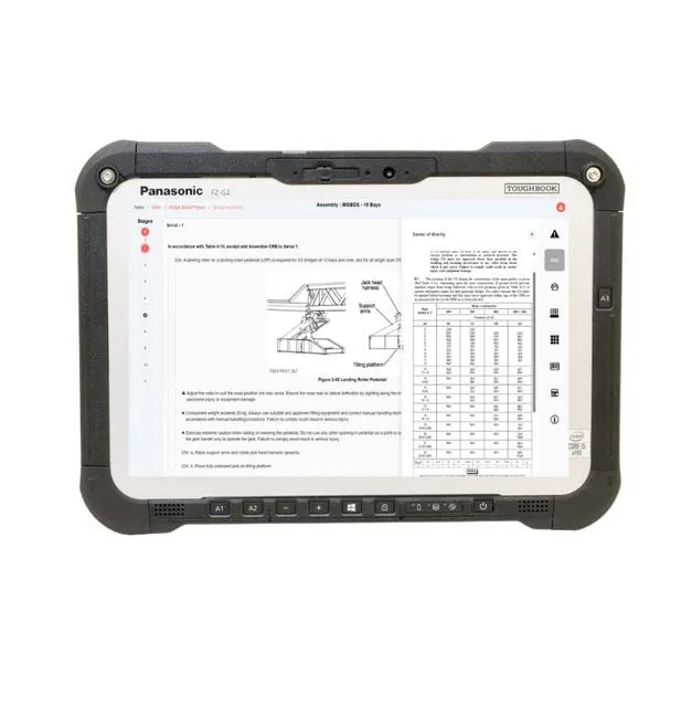A rugged tablet displaying a legacy engineering manual page with tables and diagrams